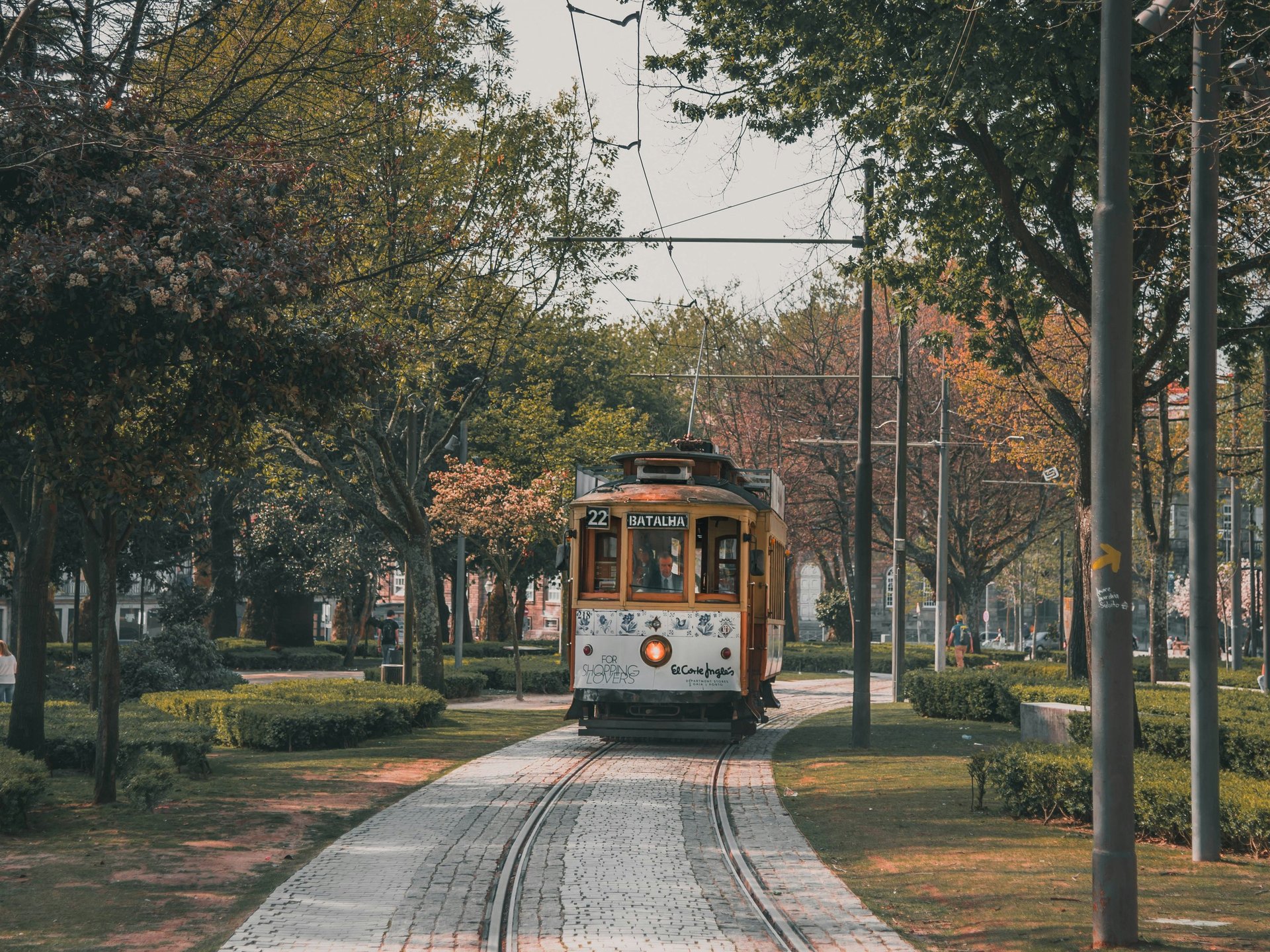 Historic yellow tram in Porto that families love to ride